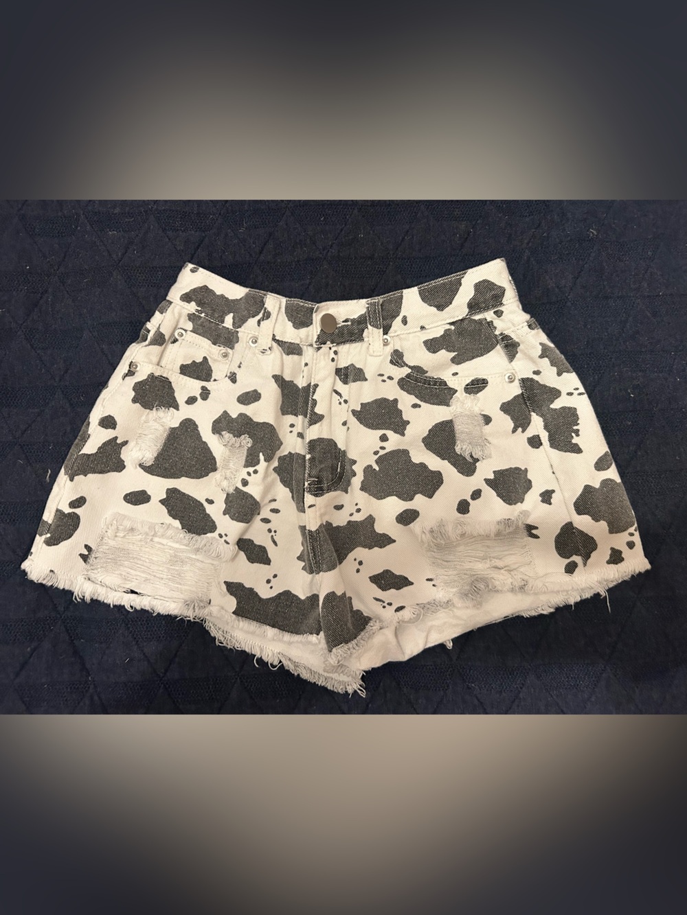 POL Cow Print Distressed Denim Shorts